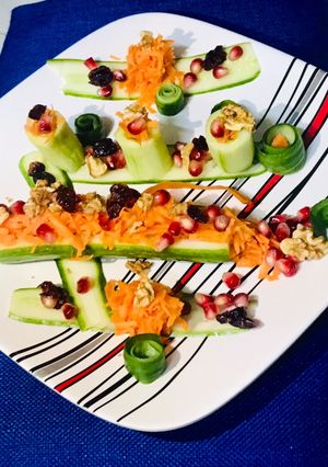 A picture of Salad with richness of walnuts & dried cranberries.