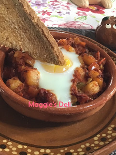 Una foto de Huevos a la flamenca mexicanos