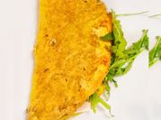 Una foto de tortilla de rúcula