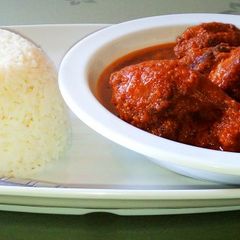 White rice/ guinea fowl stew😋😋 A picture of White rice/ guinea fowl stew😋😋.