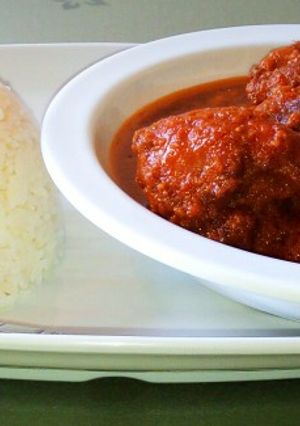 A picture of White rice/ guinea fowl stew😋😋.