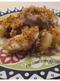 Una foto de Rape al horno con almendra crocante