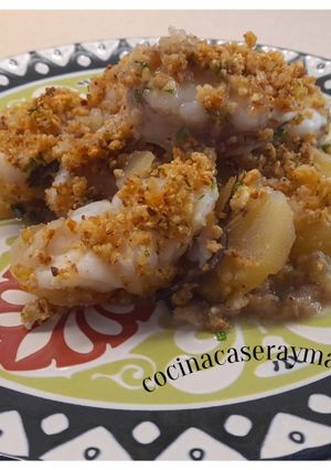 Una foto de Rape al horno con almendra crocante