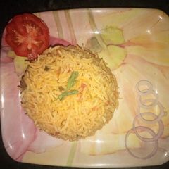 A picture of Tomato pulao.