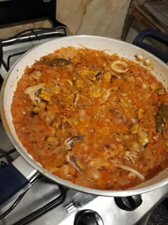 Una foto de Mix de calamares con arroz