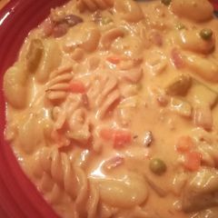 A picture of Gnocchi in white sauce.