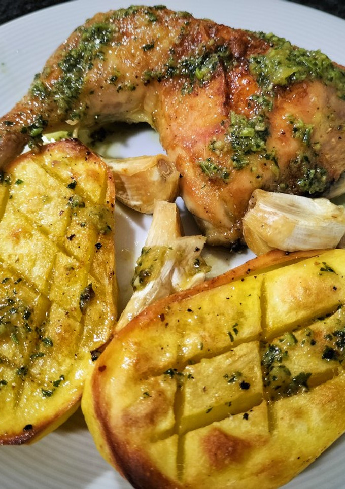 Una foto de Pollo al horno con patatas