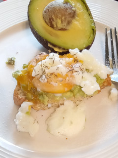 A picture of Smashed 🥑 on toast with poached egg 😋😋.