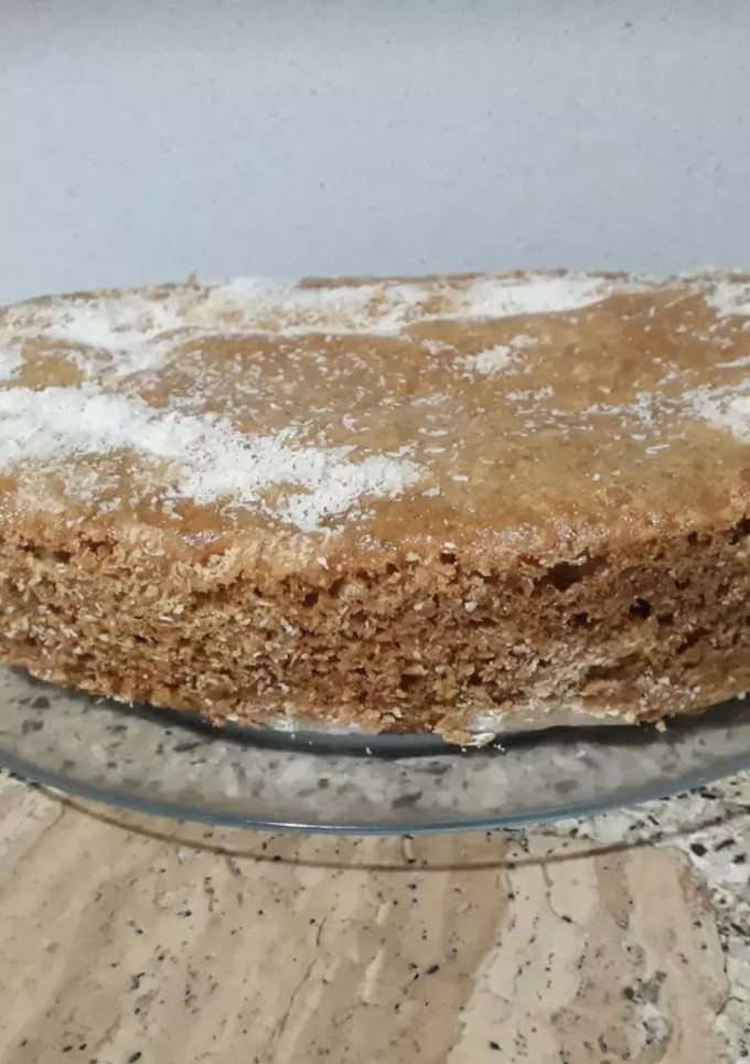 Una foto de Bizcochuelo de Cacao y jengibre relleno de coco 🥥🍫