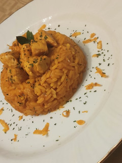 Una foto de Arroz con pollo a la naranja