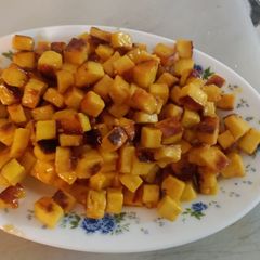 Paneer tossedwith sugar syrup A picture of Paneer tossedwith sugar syrup.