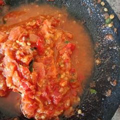 A picture of Chili Sauce with Kaffir lime leaves (Sambal jeruk purut).