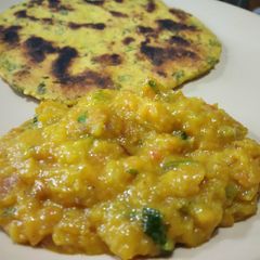 A picture of Turnip saag with makki roti.