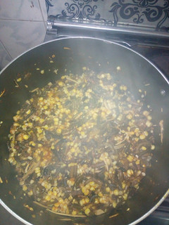 A picture of Fresh corn, akidi and ugba.