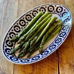 A picture of Sauteed Asparagus with soy sauce and butter.