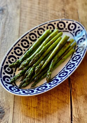 A picture of Sauteed Asparagus with soy sauce and butter.