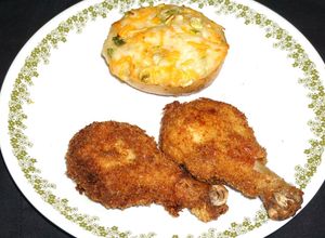Una foto de Trutros y alitas de pollo fritas