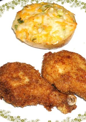 Una foto de Trutros y alitas de pollo fritas