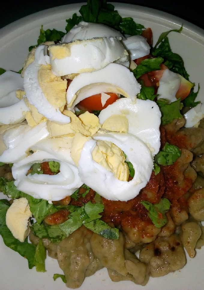 A picture of Dan wake with salad.