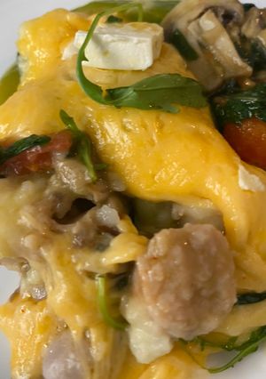 A picture of Sausage bake with veg.