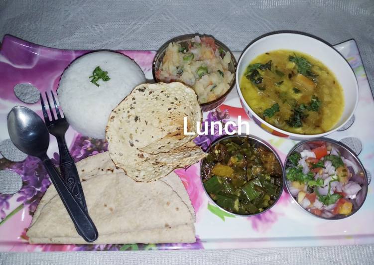 Fry dal masala bhindi boiled rice potato Chokha salad papad Fry dal masala bhindi boiled rice potato Chokha salad papad