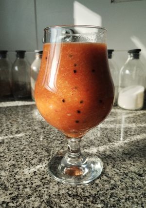 Una foto de Licuado de fruta de la pasión, mandarina y durazno