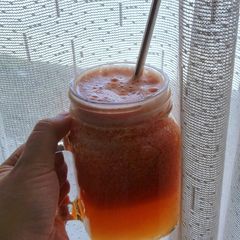 A picture of Pear Tomato and Carrot Juice.
