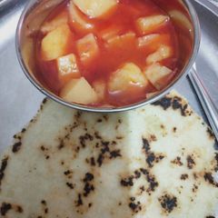 A picture of Savak ki roti with potatoes veg.