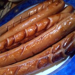 A picture of Bbq hotdogs.