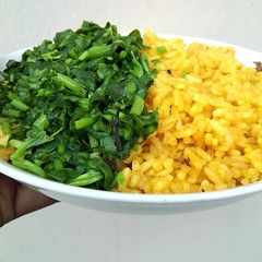 A picture of Steamed WATERLEAF on Jollof Rice.