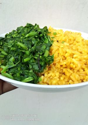 A picture of Steamed WATERLEAF on Jollof Rice.