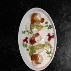 A picture of Moog dal dahi pakodi.