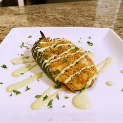 A picture of Southwestern stuffed poblanos.