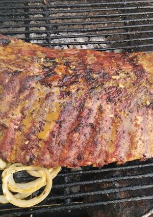 Una foto de Costillar Americano, mi propio estilo 🍗🍷