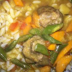 A picture of Vegetable meatball soup.