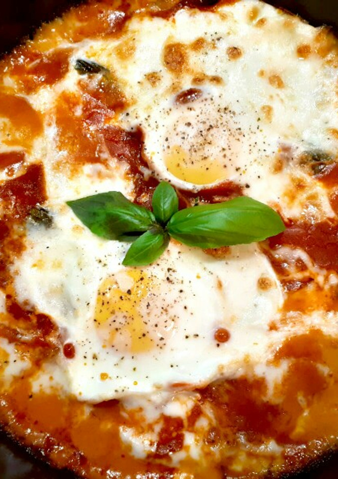 Una foto de Huevos al plato gratinados