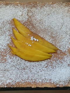 Una foto de Tiramisú de mango
