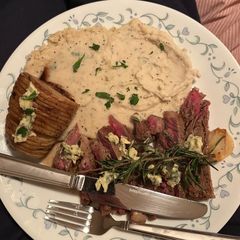 A picture of Pomme Purée, Hasselback Potato, and Colorado Angus Beef T-Bone Steak.