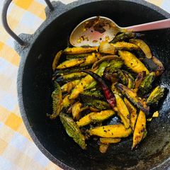 A picture of Pyaj Karela fry (Onion and bitter gourd fry).