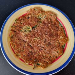 A picture of Moong sprout and vegetable chilla.