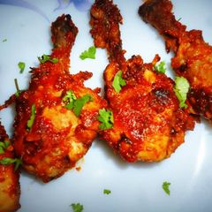 A picture of Deep fried drumsticks.