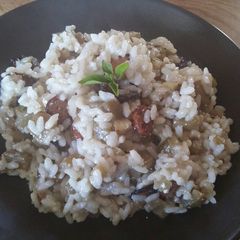 A picture of Eggplant and sausage risotto.