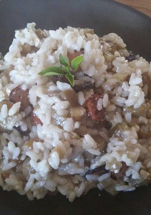 A picture of Eggplant and sausage risotto.
