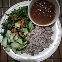 A picture of Rice, beans salad and pepper onions source.