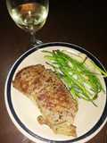 Corte Rib eye y espárragos con papa de guarnición