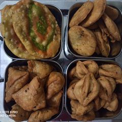 A picture of Special recipe of namkeen samosa swirl papdi.