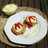 Hamburguesa de bacalao con pimientos asados