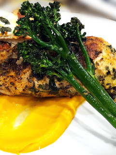 A picture of Sous Vide Stuffed Chicken Breast w/ Carrot Puree.