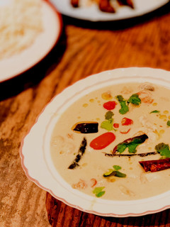 A picture of Chicken in coconut soup with galangal and chillies (Tom Kha Gai).