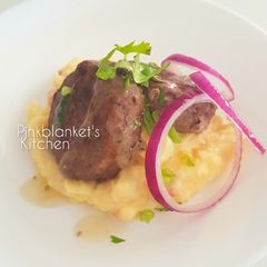 A picture of Australian Rissoles & Mashed potatoes.